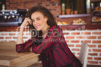 Pretty hipster woman at the cafe