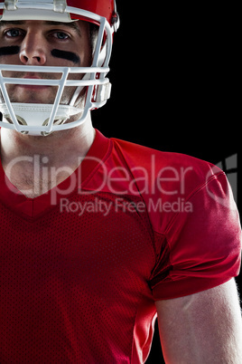 American football player looking at camera American football player looking at camera