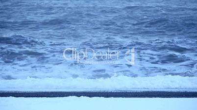 Waves at the black sand beach in Vik, Iceland