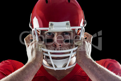American football player looking at camera American football player looking at camera