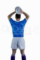 Rugby player about to throw a rugby ball