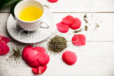 Cup of herbal tea on table