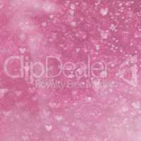 Pink bokeh in heart form. Abstract background