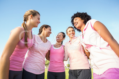 Smiling women wearing pink for breast cancer Smiling women wearing pink for breast cancer