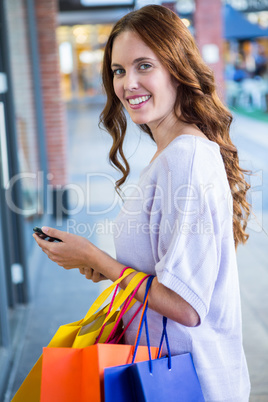 Pretty woman shopping at the mall