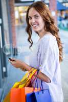 Pretty woman shopping at the mall