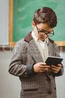 Pupil dressed up as teacher using calculator