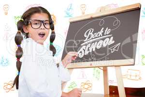 Composite image of cute pupil with chalkboard