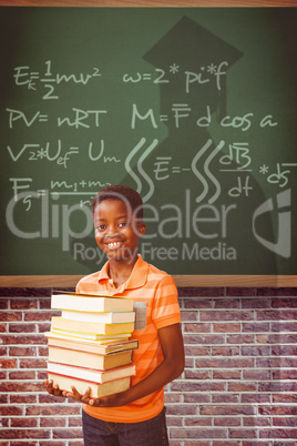 Composite image of portrait of cute boy carrying books in librar