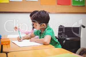 Smiling student sitting in wheelchair