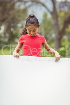 Cute pupils showing large poster