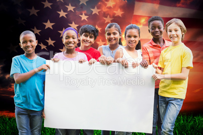 Composite image of  happy friends in the park