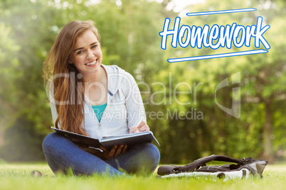 Homework against smiling student sitting and holding book