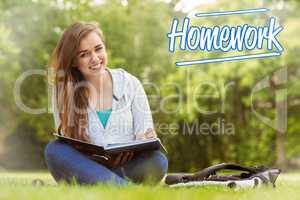 Homework against smiling student sitting and holding book