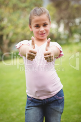 Smiling student with thumbs up