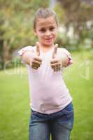 Smiling student with thumbs up