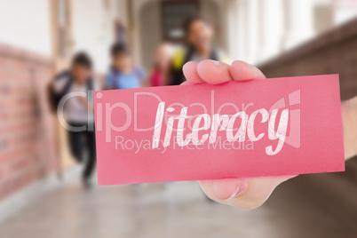 Literacy against teacher helping pupils in library