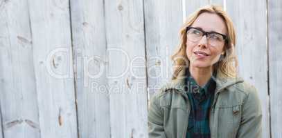 Blonde in glasses posing and thinking