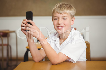 Student using a mobile phone in class