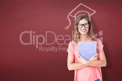 Composite image of pretty geeky hipster holding notepad