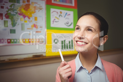 Teacher smiling in classroom