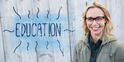 Education against portrait of blonde in glasses posing