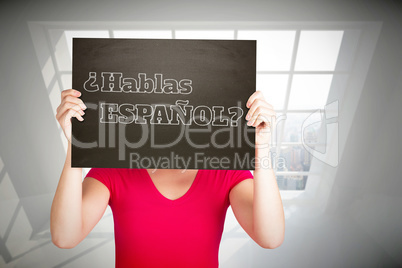 Composite image of casual woman showing board