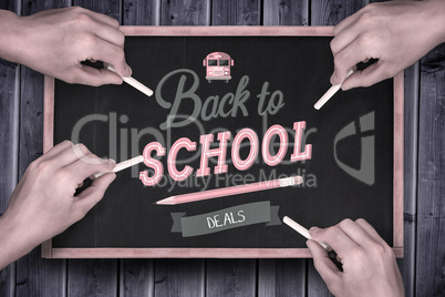 Composite image of multiple hands writing with chalk Composite image of multiple hands writing with chalk