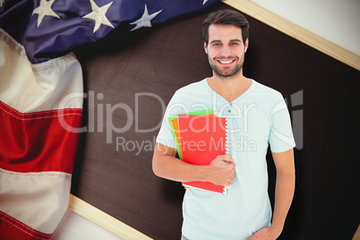 Composite image of student holding notepad