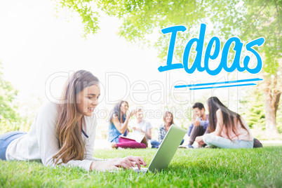 Ideas against happy student using her laptop outside