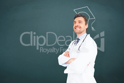 Composite image of handsome young doctor with arms crossed