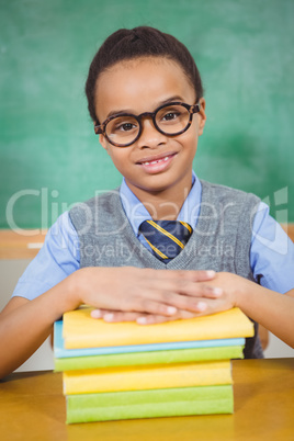 Smiling smart student with books