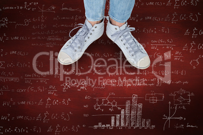 Composite image of woman wearing trainers