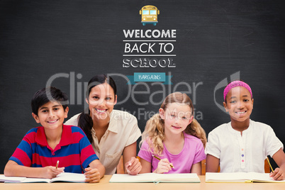 Composite image of pretty teacher helping pupils in library