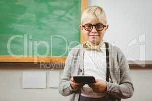 Pupil dressed up as teacher holding calculator