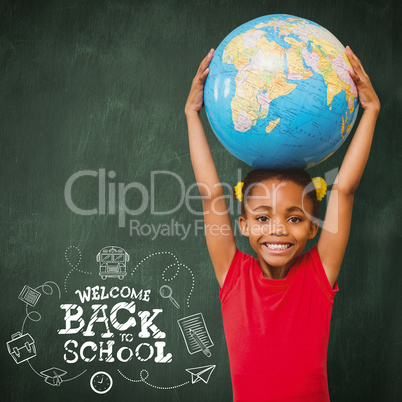 Composite image of pupil holding globe