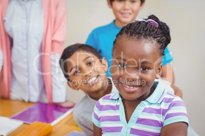 Pupils working at desk together