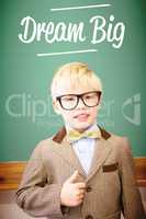 Dream big against cute pupil dressed up as teacher in classroom