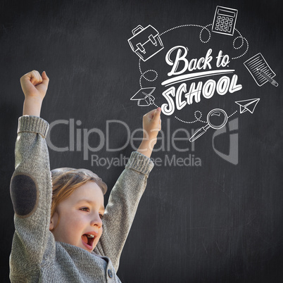 Composite image of cute little boy cheering in park