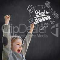 Composite image of cute little boy cheering in park