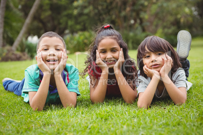 Children lying on the grass