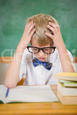 Frustrated student reading books