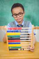 Student using an abacus in class