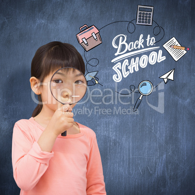 Composite image of pupil looking through magnifying glass