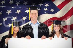 Composite image of three students having graduated holding a bla