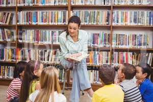 Teacher reading her pupils a story