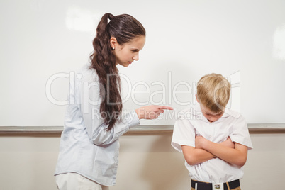 Teacher punishing the bold student