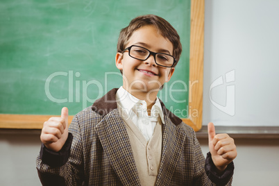 Smiling pupil dressed up as teacher doing thumbs up