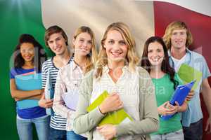 Composite image of college students holding folders at college