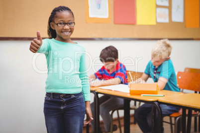 Smiling student with thumbs up